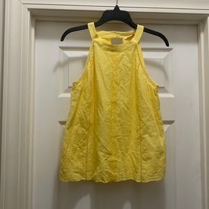 Yellow boutique top. Brand new with tags. Never worn!